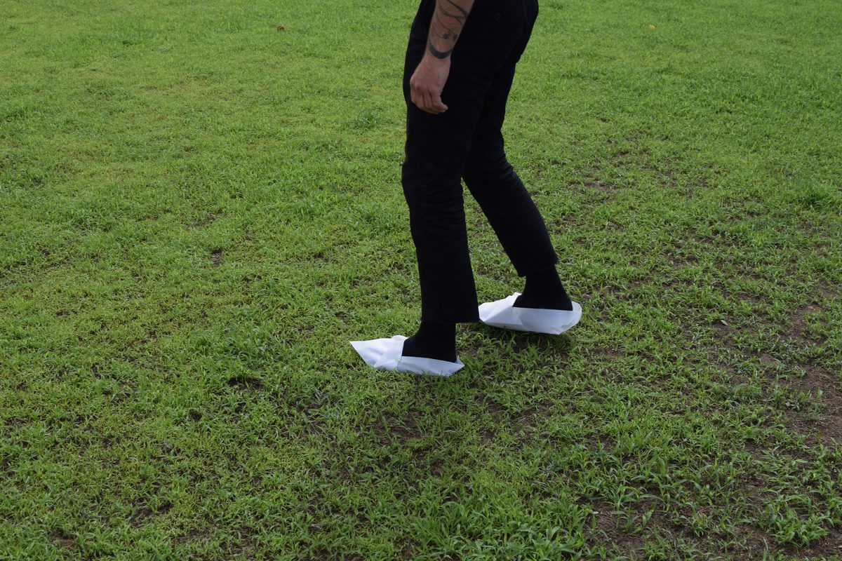 A walker stepping on the paper path